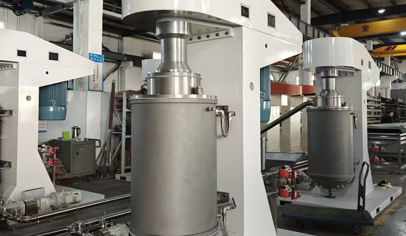 What are the components of the control system for a chocolate ball mill